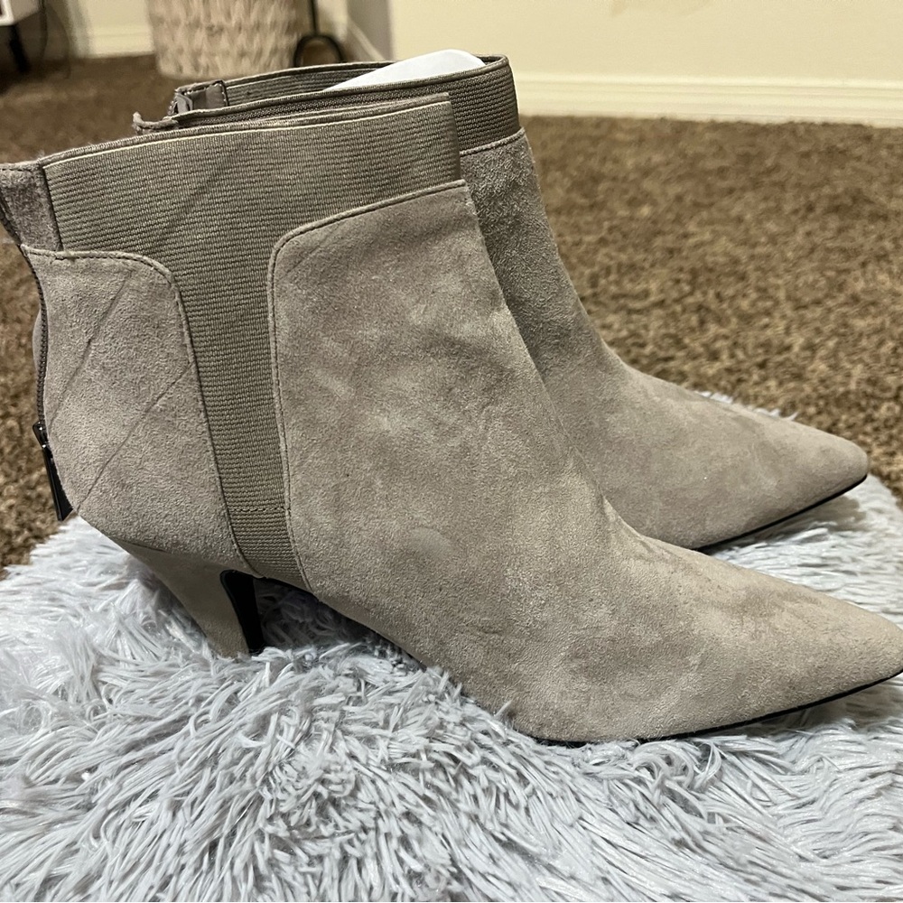 NWOT light gray kitten heel booties with back zipper entryway.